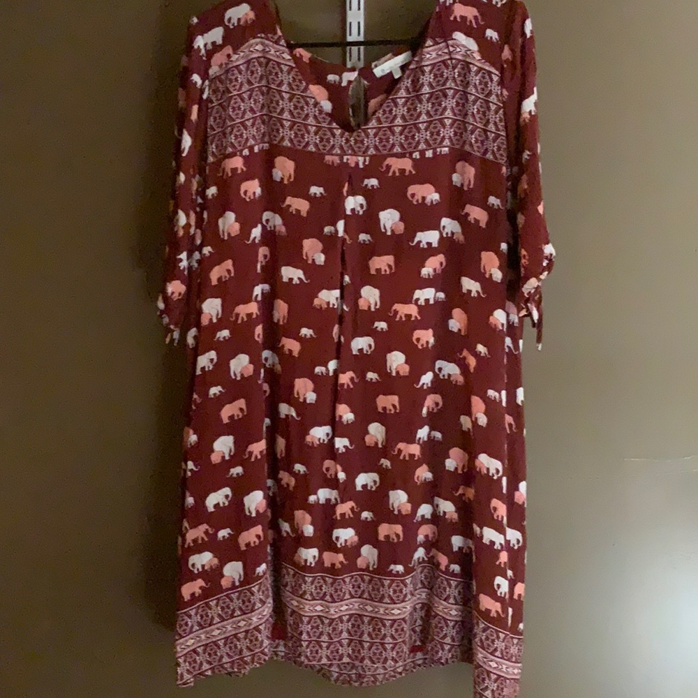 A maroon elephant midi/mini dress